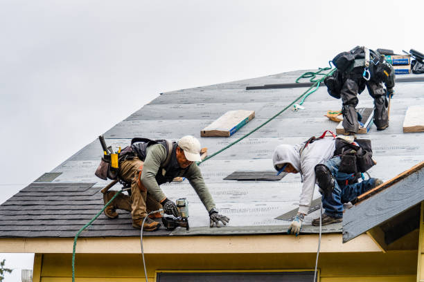 Professional Storm Damage Roof Repair technician working in Levittown, NY